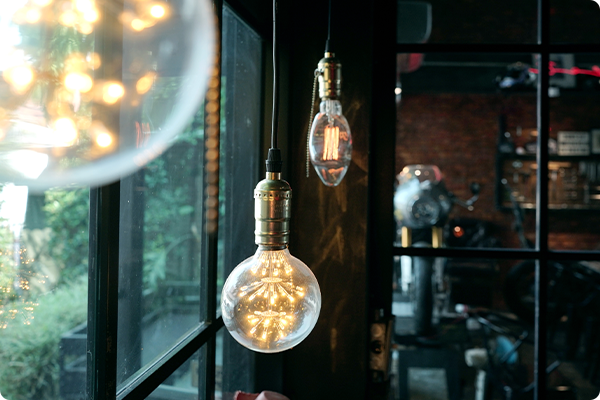 Statement decorative lighting in a boutique hotel lobby, creating ambience and visual impact.